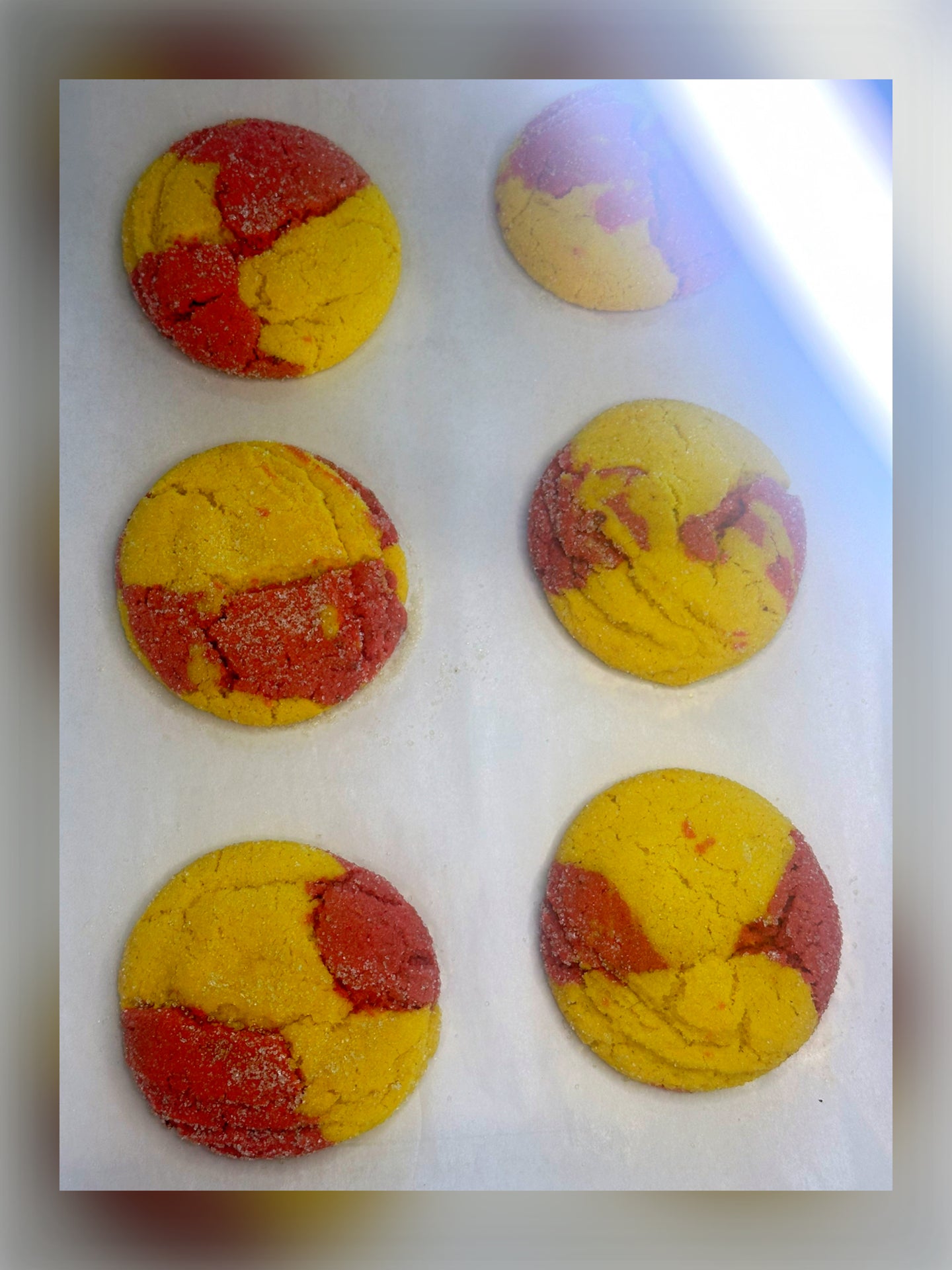 Pinky Lemonade cookie with swirls of lemon yellow and strawberry red, bursting with bright citrus flavor – available for local pickup or nationwide shipping.