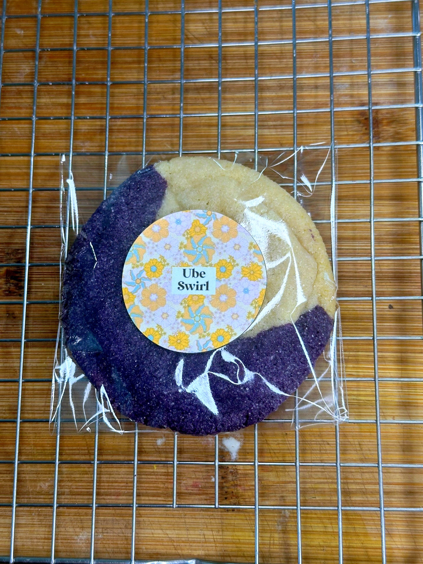 Ube Swirl- ube-infused. Blue cookie with sugar crystals and vanilla flavor